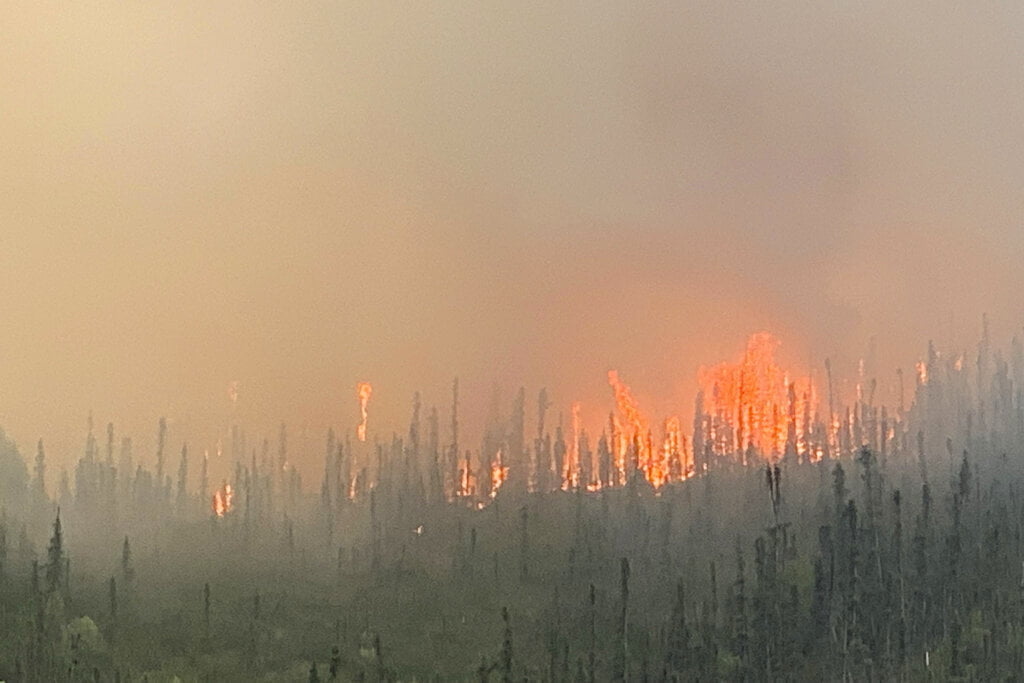 Firefighters Defend AK Resort from Advancing Wildfire