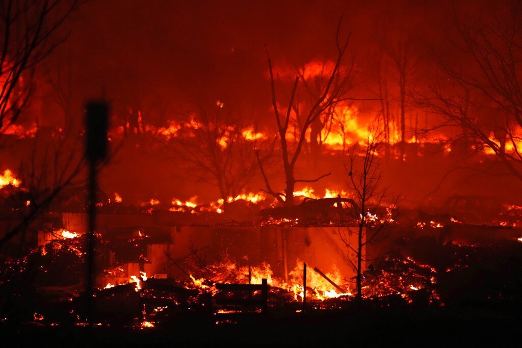 Thousands Flee as CO Wildfires Burn Hundreds of Homes