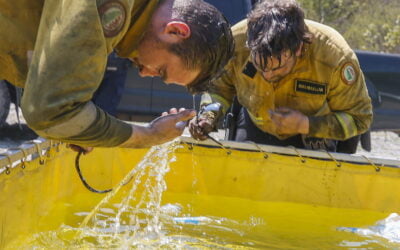 Wildland Fire in One Canadian Province Contained, While Another Burns Out of Control